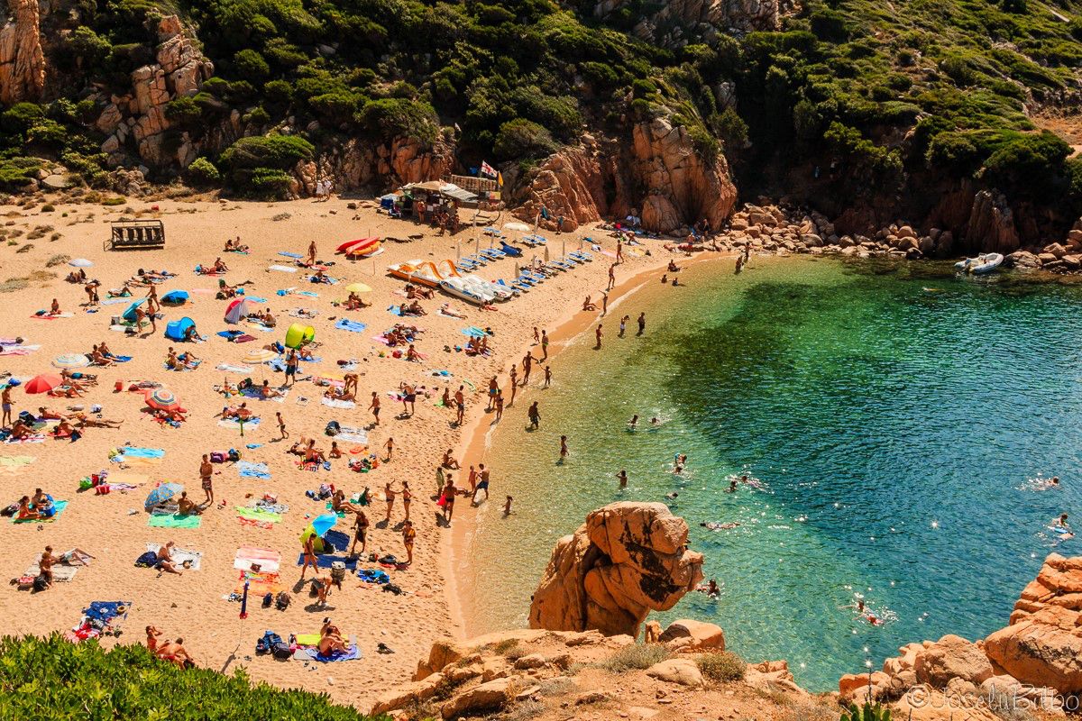Cala Cosi beach between the rocks