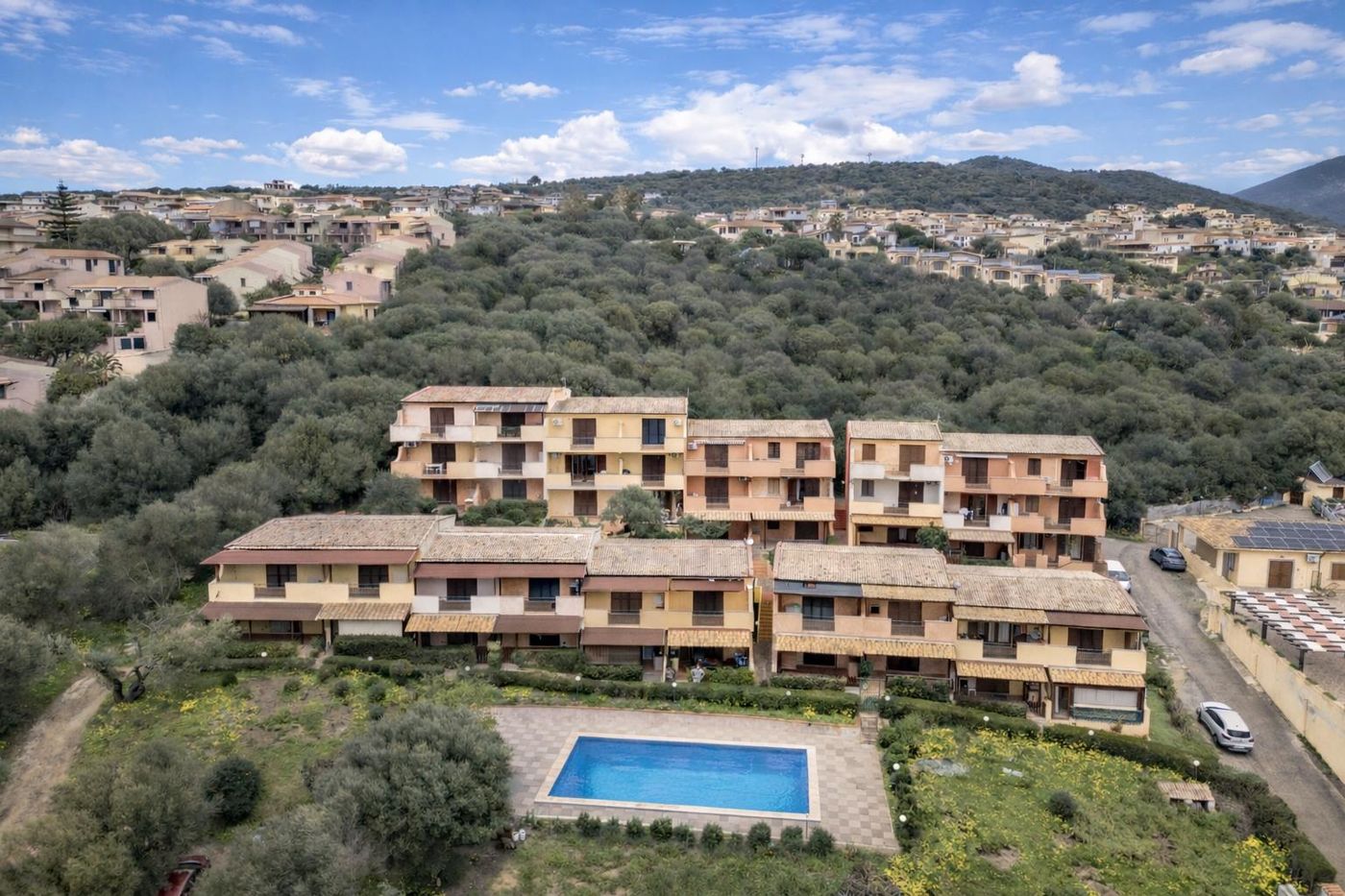 The residence and its shared pool from above