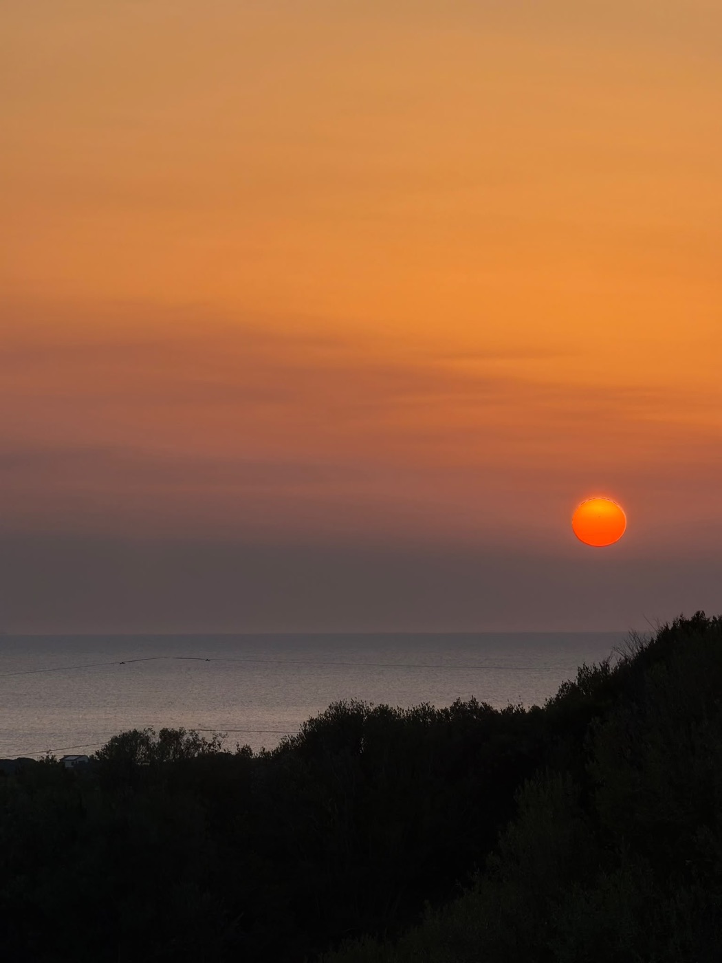 Sunset over the sea from Badesi
