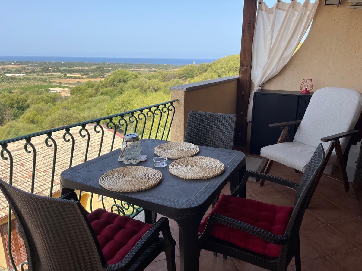 Veranda with sea and countryside views